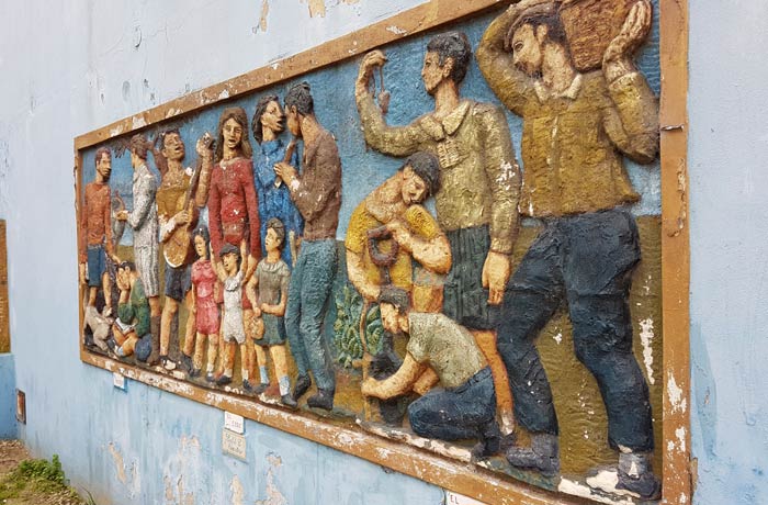 Mural "El maestro. El coro. El trabajo" visitar La Boca